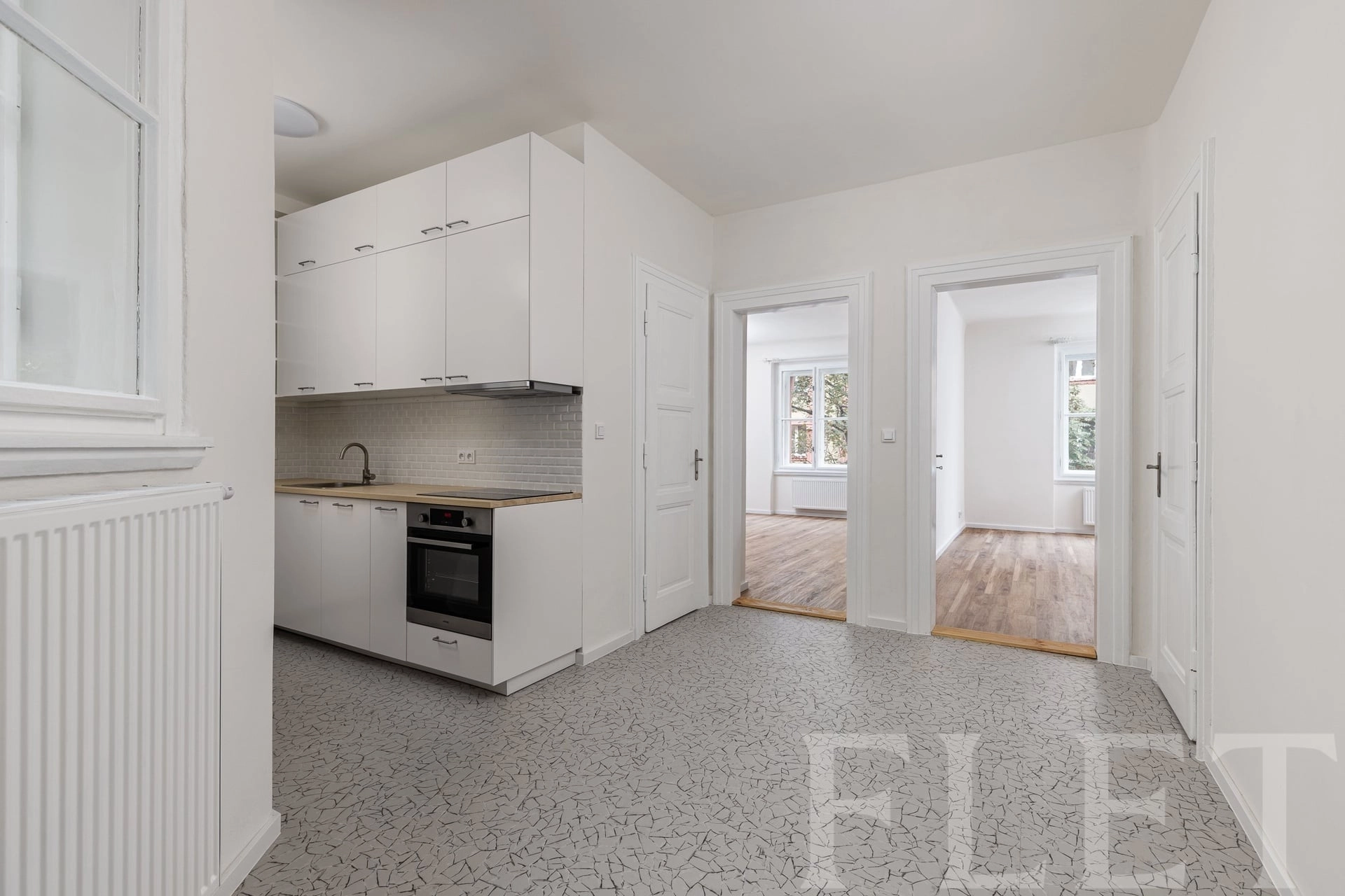 Velkorysé 2+1 v žádaném patře: 70 m² holešovického prostoru s jistým výnosem